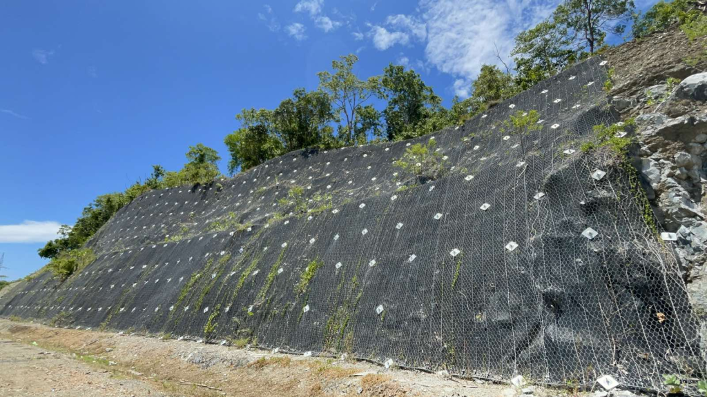 Modified Geogrid for Slope Erosion Control installed on highway embankment slope stabilization project