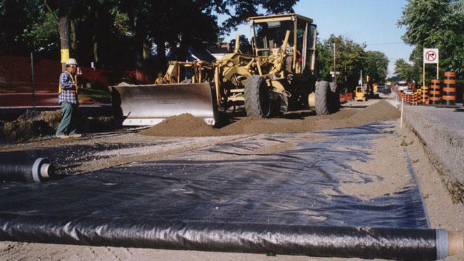 Heavy duty geotextile fabric installed in road construction project
