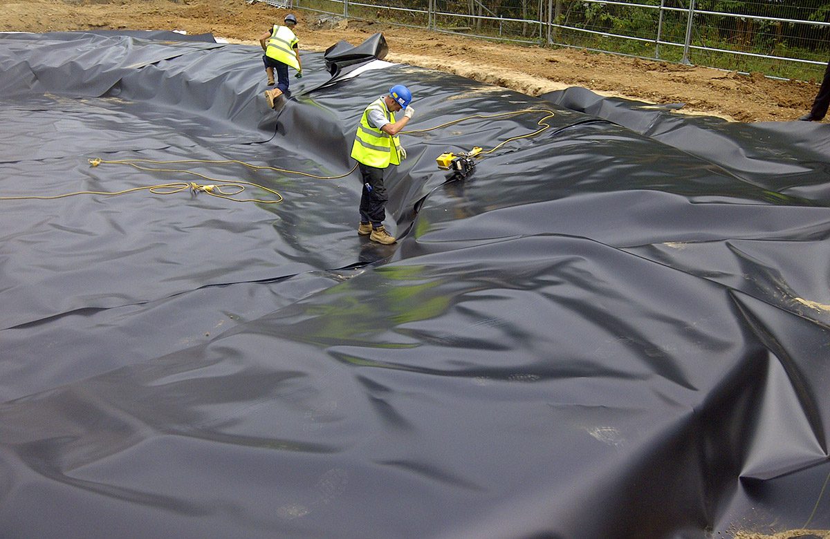 How thick is a geonet for underground drainage systems with HDPE drainage cores behind retaining walls and foundations
