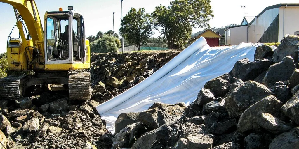 Protecting the Environment with Geosynthetics in Contaminated Soils