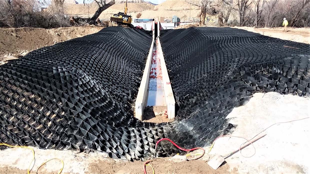 How to install geocells with aggregate infill and compaction for soil stabilization and erosion control