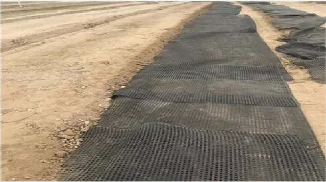 Engineering student using a geogrid game simulation to learn geosynthetics and soil structure design
