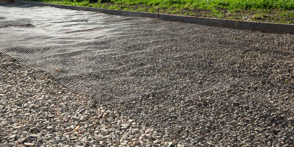 Installation of geogrid fabric for soil stabilization
