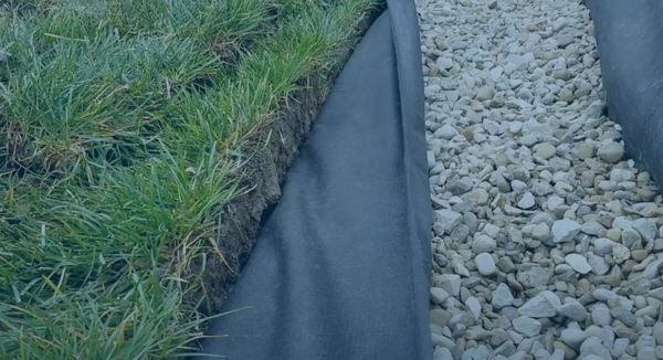 Geotextile drainage fabric installed in a civil engineering drainage system
