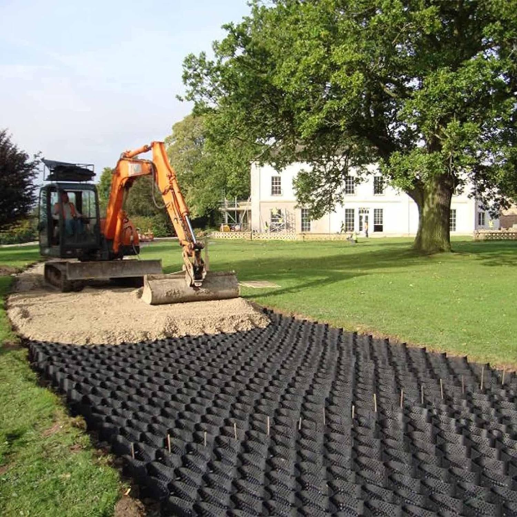 Geo grid ground grid installation for soil stabilization and road construction