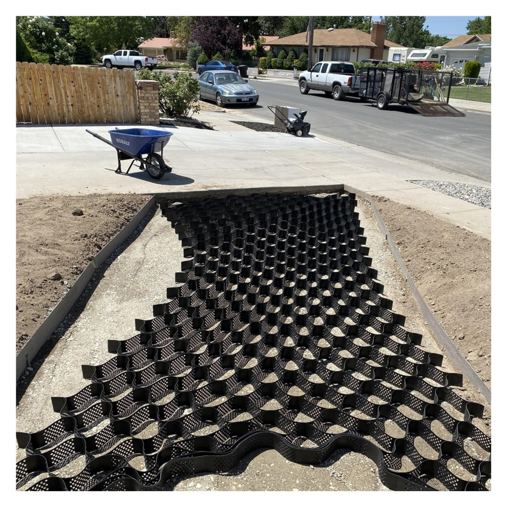 Geogrid mesh installation for stabilizing gravel driveways
