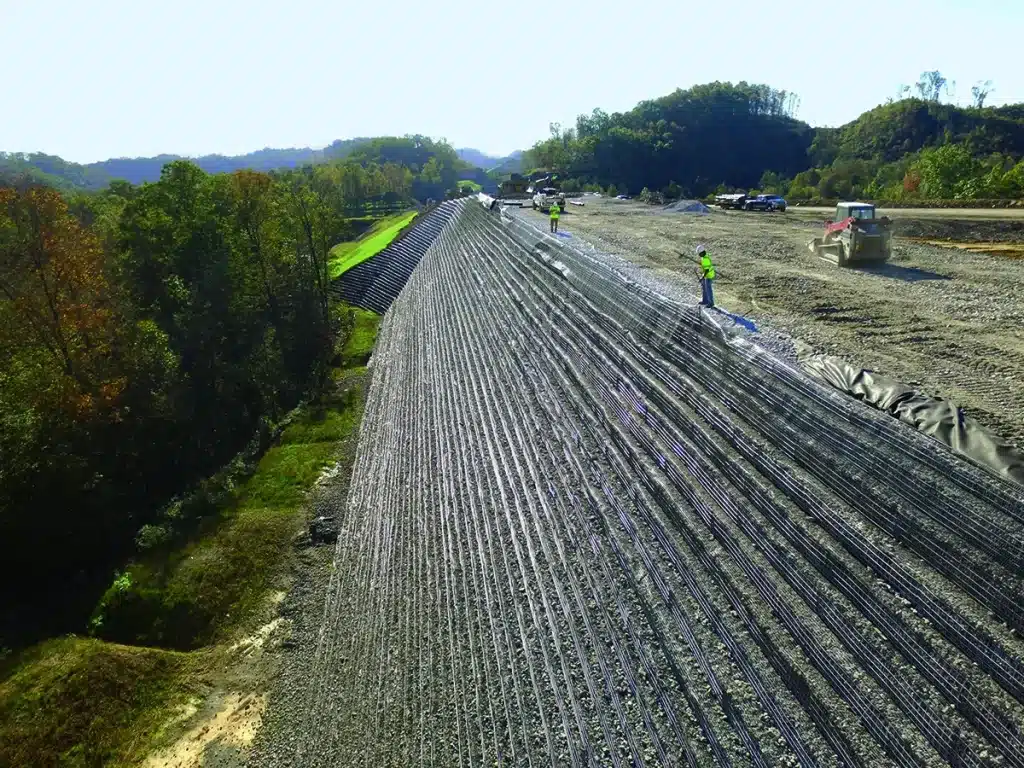 Retaining wall engineering project utilizing geonet geosynthetics for groundwater drainage