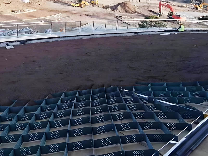 Slope protection engineering project with geocell material for erosion control and hillside stabilization