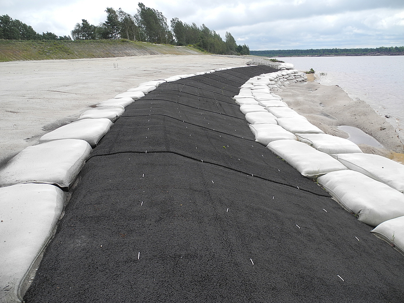 Coastal protection engineering project using geotextile bags for shoreline erosion control