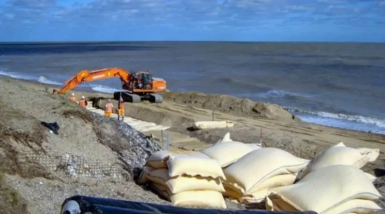 Coastal protection project with non woven geotextiles for erosion control and shoreline stabilization