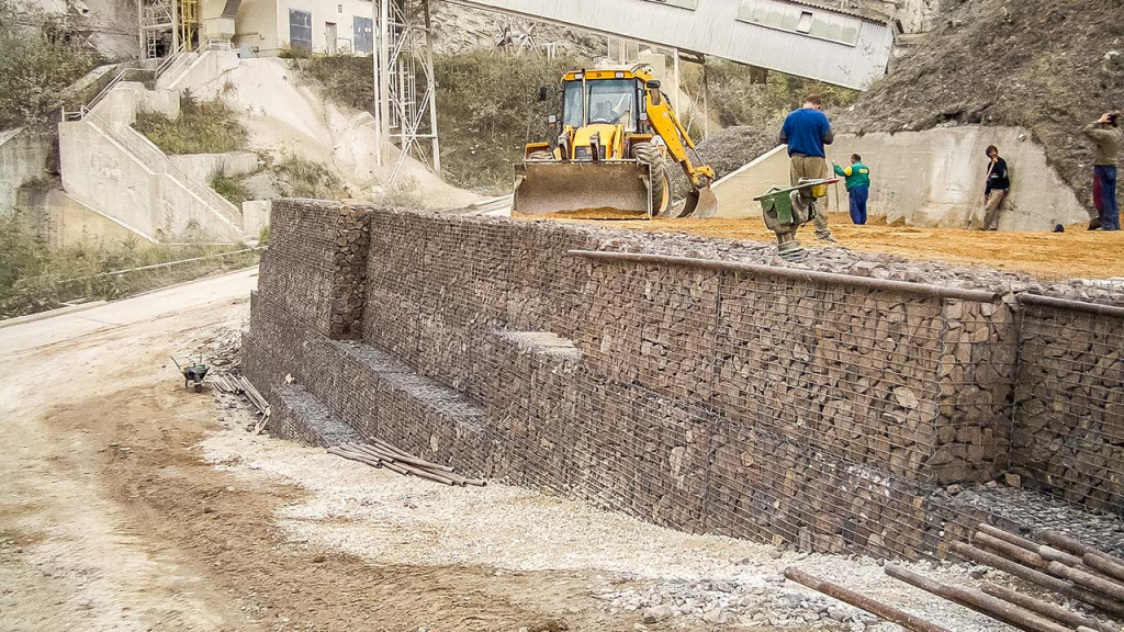 Retaining wall engineering project reinforced with geogrid fabric for slope stabilization